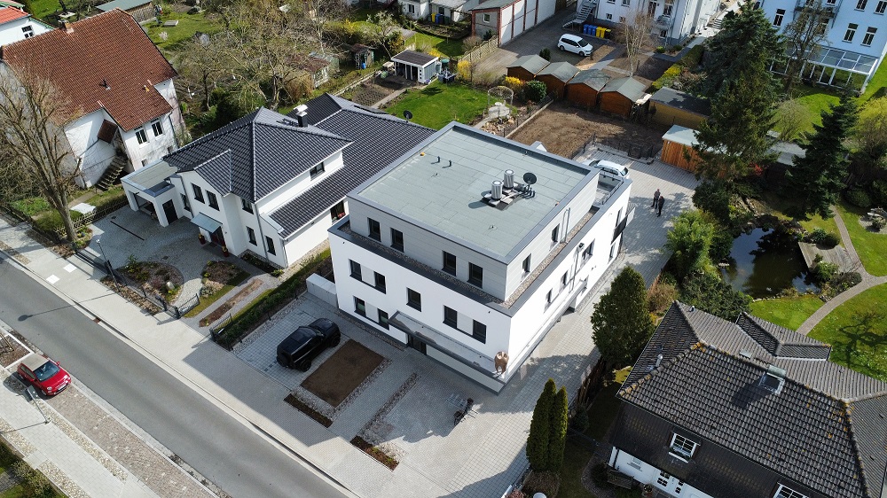 Neubau eines Mehrfamilienhauses mit 2 WE und einer Arztpraxis